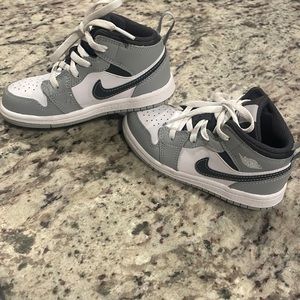 Toddler size 9 white & gray Jordan 1 mid -slightly worn great condition.